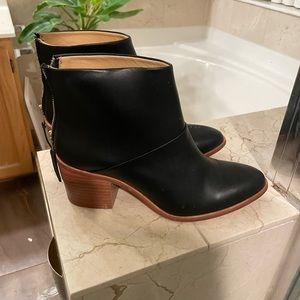 Nisolo black boots